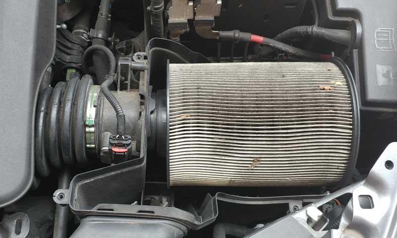 Remove screws holding the air filter